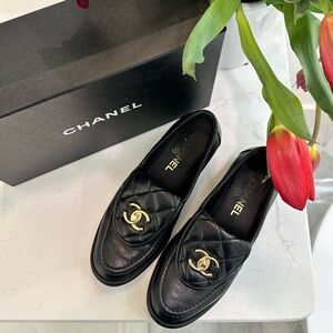 Authentic CHANEL Black Quilted Leather Loafers with Gold CC Emblem